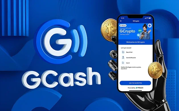 GCash GCrypto promotional image with smartphone showing the GCrypto app, held by a robotic hand, with Bitcoin coins and blue 3D shapes